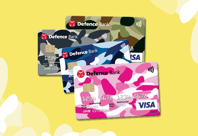 The four Visa Debit card camo designs with the pink version at the forefront against a yellow background.